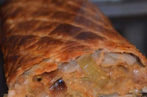 whole onion and lentil filling in a pastry casing