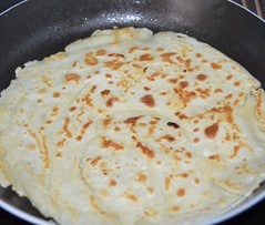 pancake cooking in pan