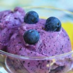 blue-ices-with-berries-on-top-in-glass-bowl