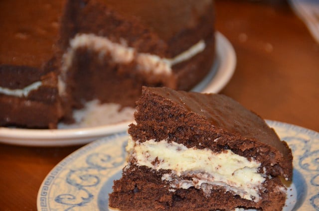 slice of chocolate cake with buttercream filling