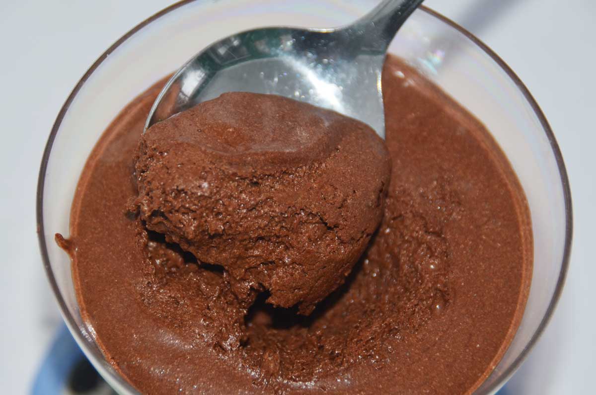 Chocolate mousse with spoon in middle