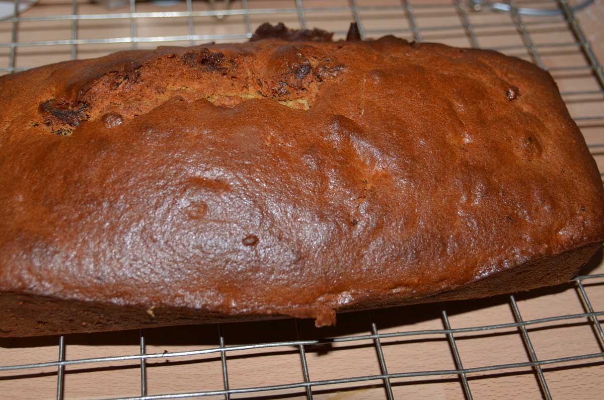 whole date and walnut loaf on cooling rack