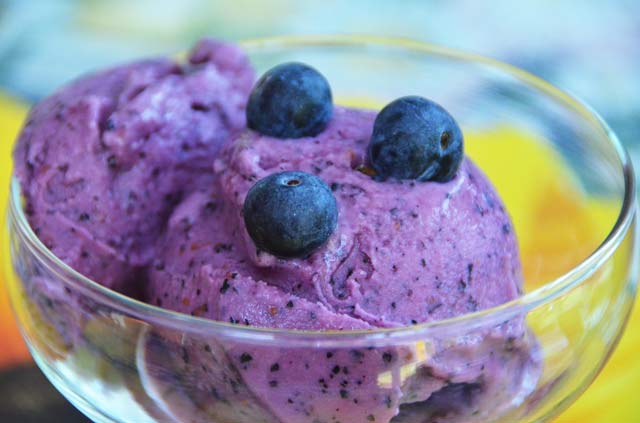 berry frozen yoghurt in a glass dessert bowl