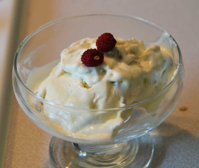 portion-gooseberry-icecream-with-strawberry-on-top