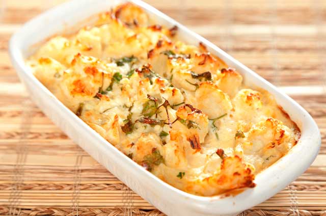 caulliflower and cheese in a baking dish straight from the oven