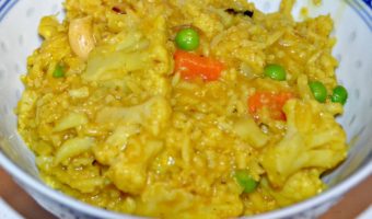 cauliflower curry and rice in a bowl