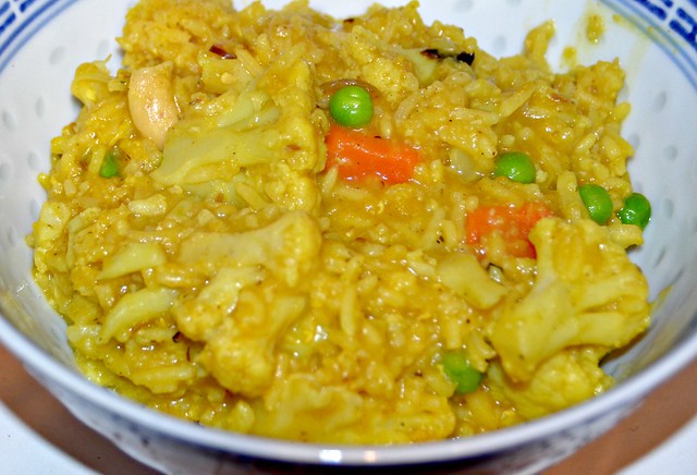 cauliflower curry and rice in a bowl