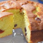 whole-cherry-cake-with-slice-removed-to show-cherries