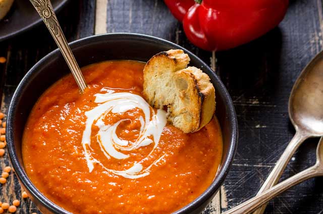 rich red soup with bread