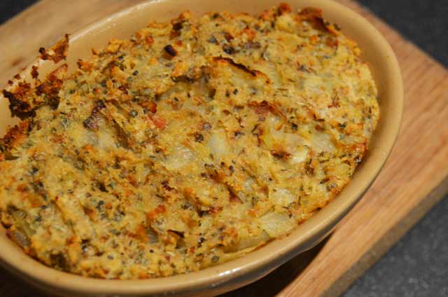 traditional sage and and onion stuffing in a retro pie dish