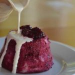 summer-pudding-with-cream-being-poured-over