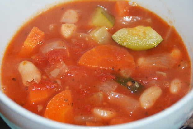 carrot, courgette, onion an d beans in a tomato based soup