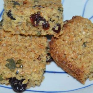 three-squares-flpajacks-on-plate-showing-fruit-seeds