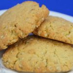 three aot biscuits on a floral plate