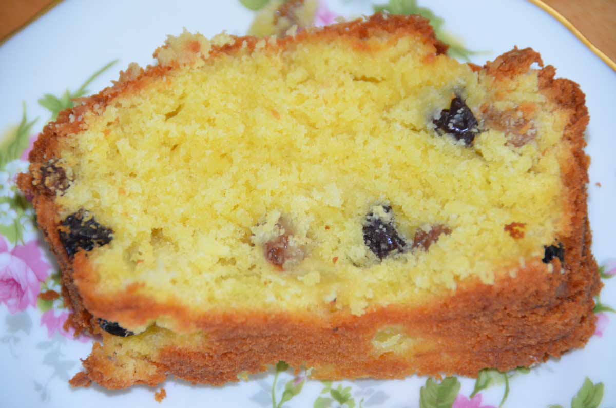 slice of pineapple and coconut cake on a plate 