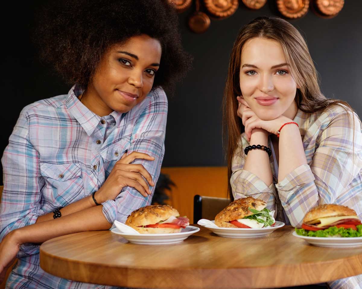 two women in cafe with food