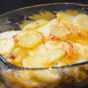 sliced potatoes in a glass dish