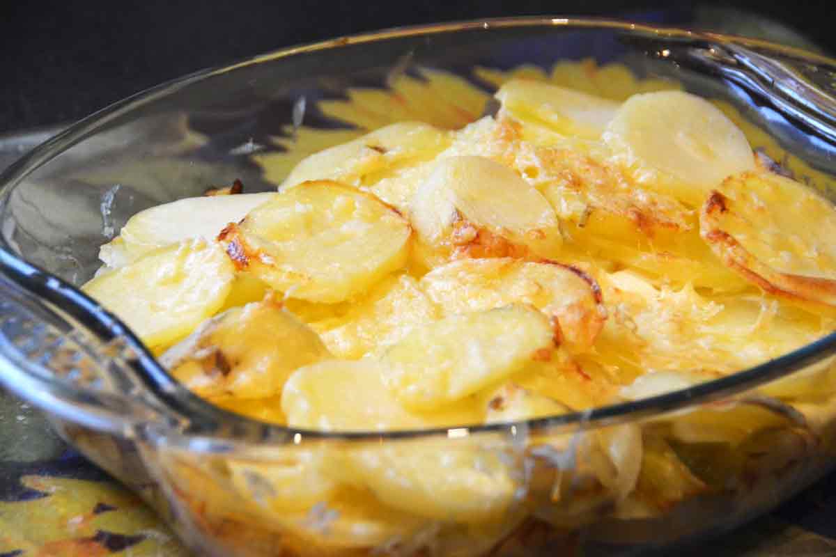 sliced potatoes in a glass dish