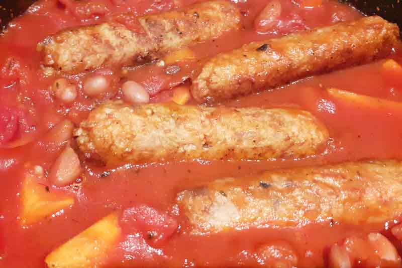 sausages-beans-carrots in tomatoes