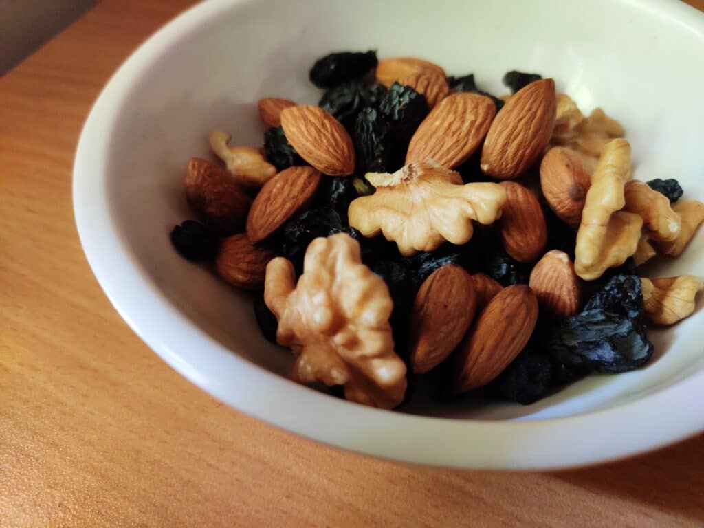 bowl of mixed nuts and rasins
