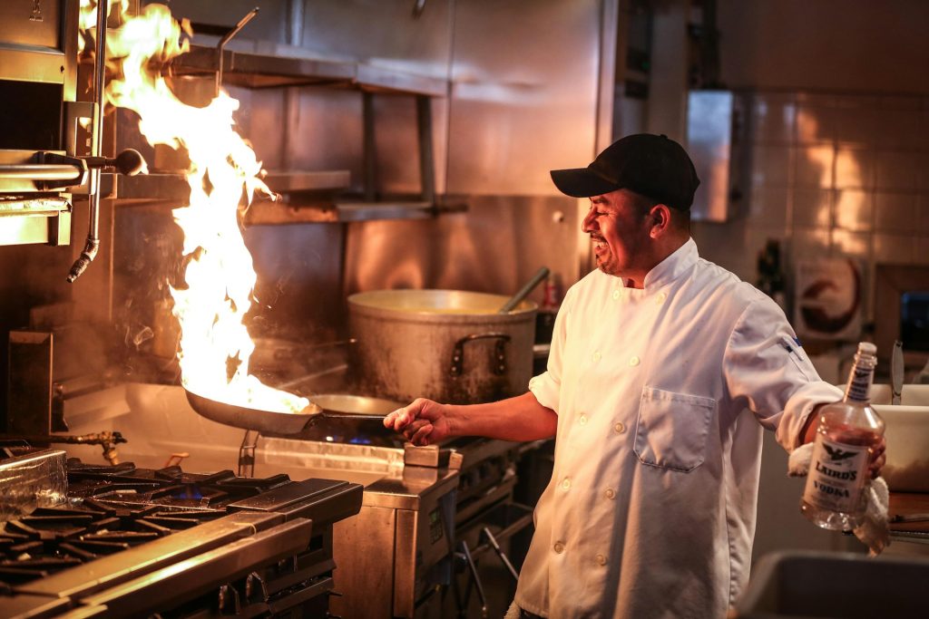 Johnathan Macedo in the kitchen cooking